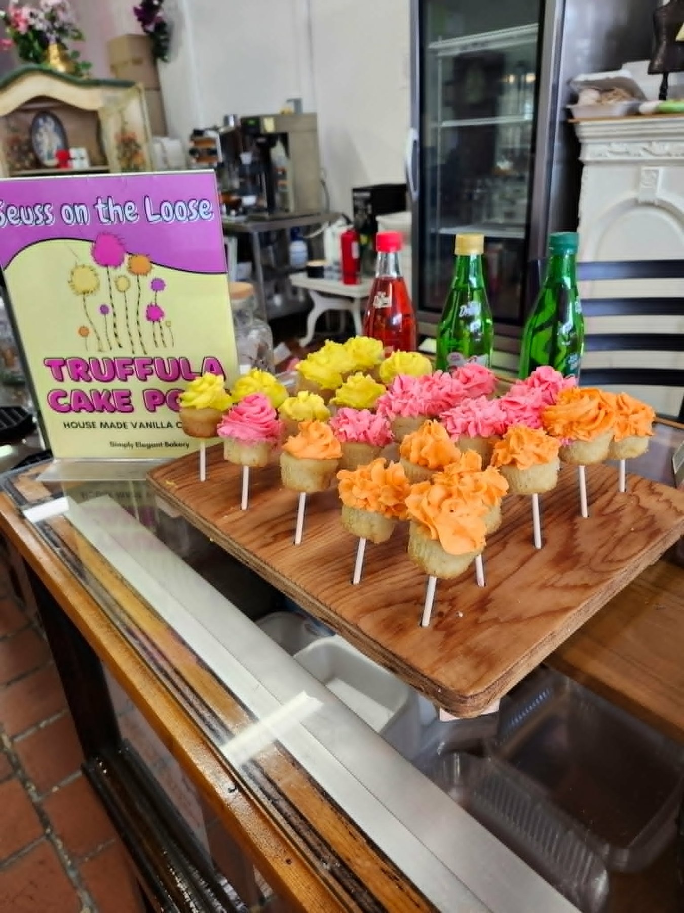 Colorful truffula-inspired cake pop display