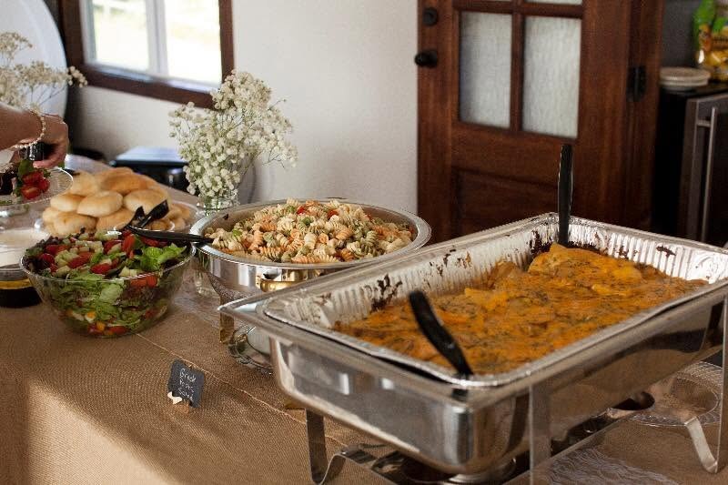 Buffet with pasta, salad, and baked entrée