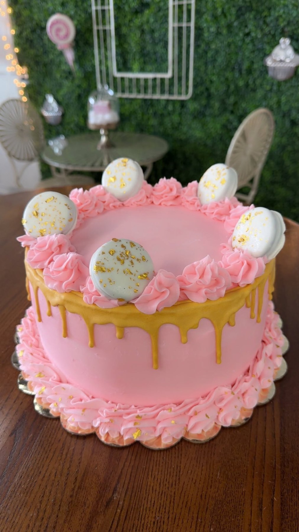 Pink and gold drip cake